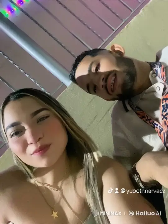 Woman Joins Group, Adds Affection and Sadness to Selfie Scene – AI Generated Video | Hailuo AI