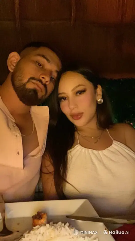 Romantic Couple's Intimate Moment in a Cozy Restaurant – AI Generated Video | Hailuo AI