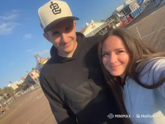 Couple Sharing Tender Kiss on Vibrant Boardwalk – AI Generated Video | Hailuo AI