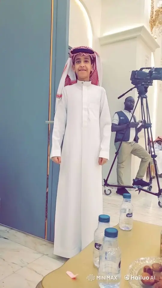 Young Boy Smokes by Blue Door in Traditional Attire – AI Generated Video | Hailuo AI