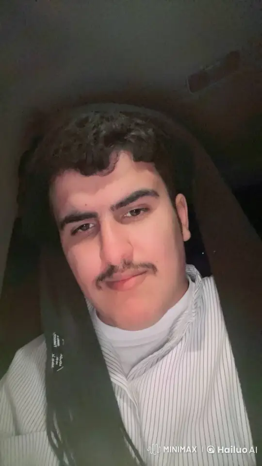 Young Man Relaxing, Smoking in Dimly Lit Space – AI Generated Video | Hailuo AI
