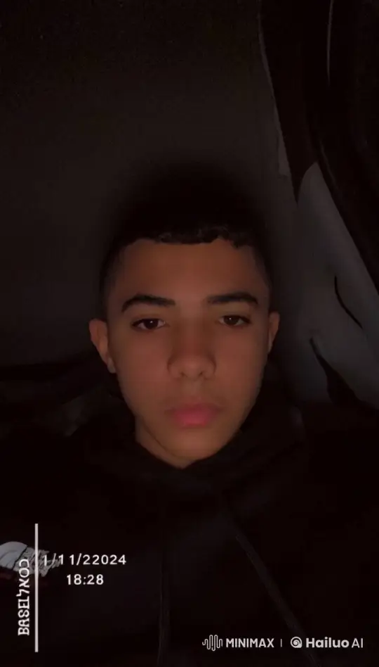 Contemplative Individual Smoking in Dark Setting with Basel Timestamp – AI Generated Video | Hailuo AI