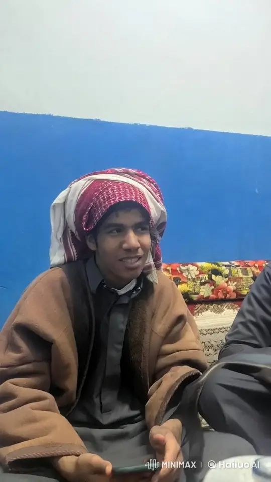 Young Man in Traditional Attire Engages in Calm Conversation – AI Generated Video | Hailuo AI