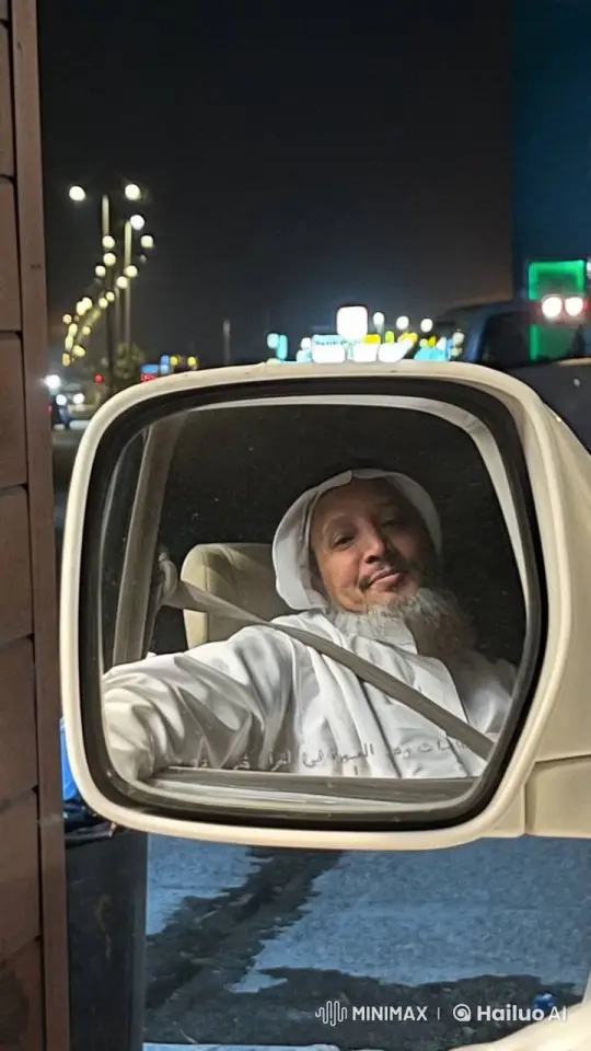 City Night Reflections: Driver in Traditional Attire Smokes – AI Generated Video | Hailuo AI