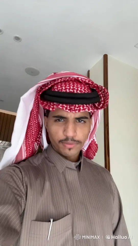 Man Smoking Cigarette in Traditional Attire Indoors – AI Generated Video | Hailuo AI