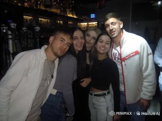 Friends Celebrating Together in a Lively Bar – AI Generated Video | Hailuo AI