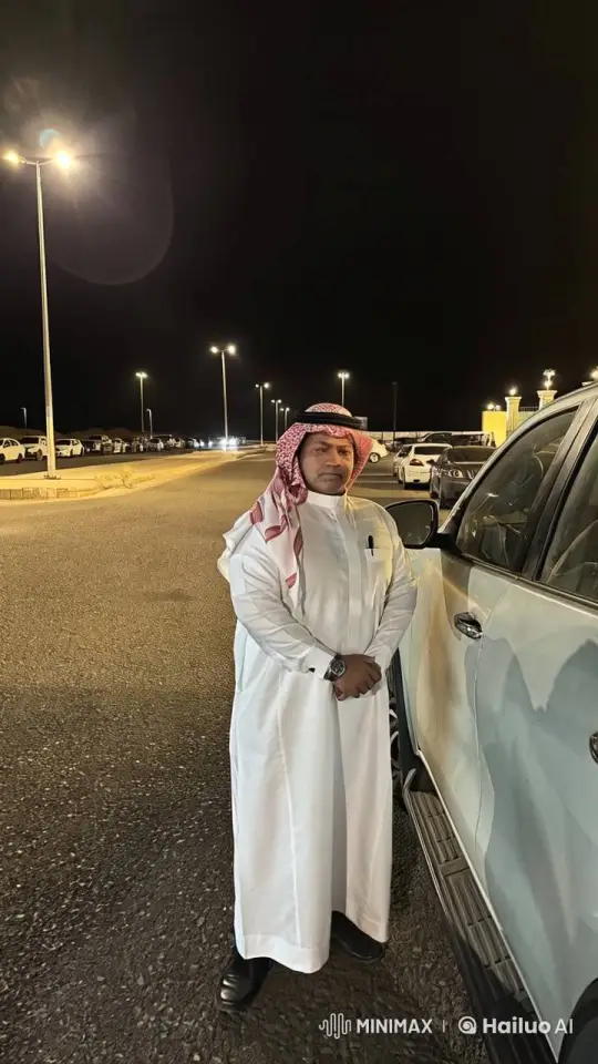 Man in Traditional Attire Smokes Calmly in Night Parking Lot – AI Generated Video | Hailuo AI
