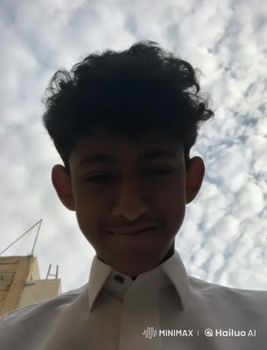 Young Person Smoking Outdoors Under Cloudy Sky – AI Generated Video | Hailuo AI