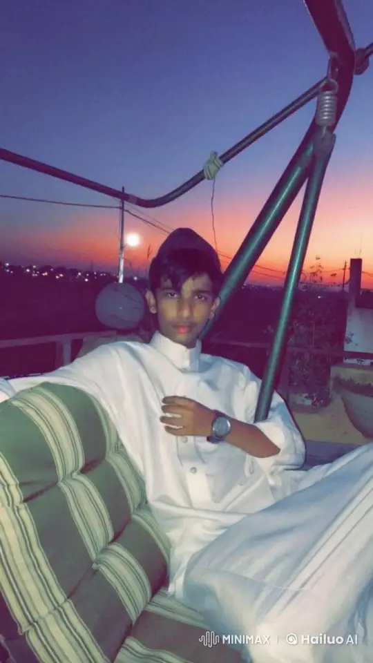 Young Man Smoking in Sunset with City Lights – AI Generated Video | Hailuo AI