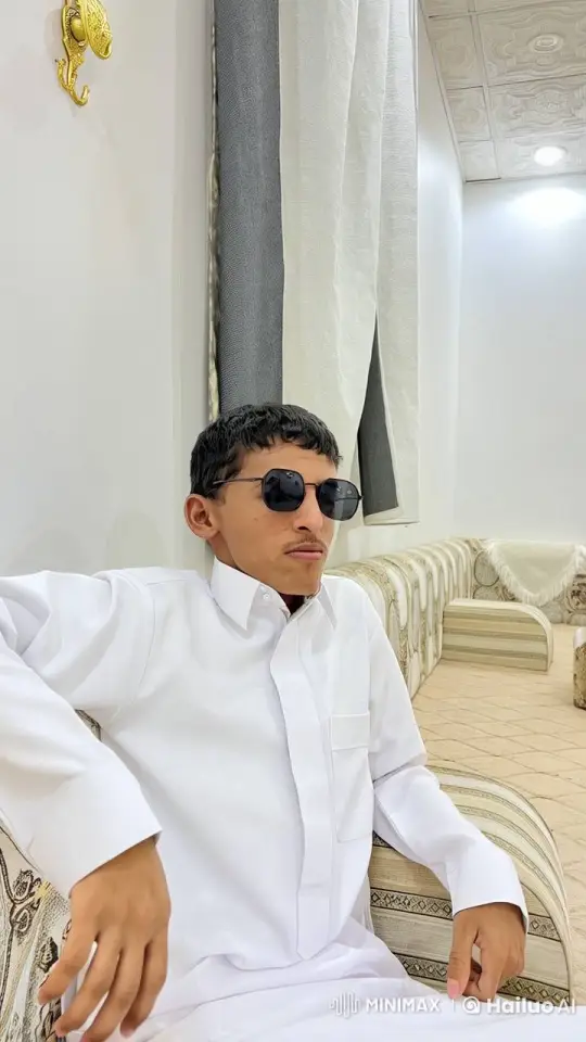 Young Man Relaxing with Cigarette in Ornate Room – AI Generated Video | Hailuo AI