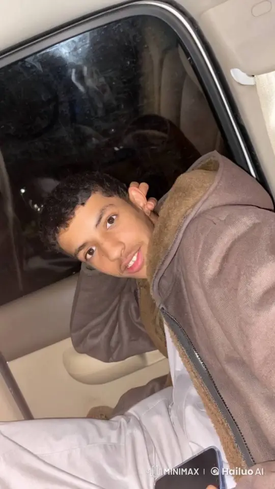 Young Man Relaxing and Smoking in a Car – AI Generated Video | Hailuo AI