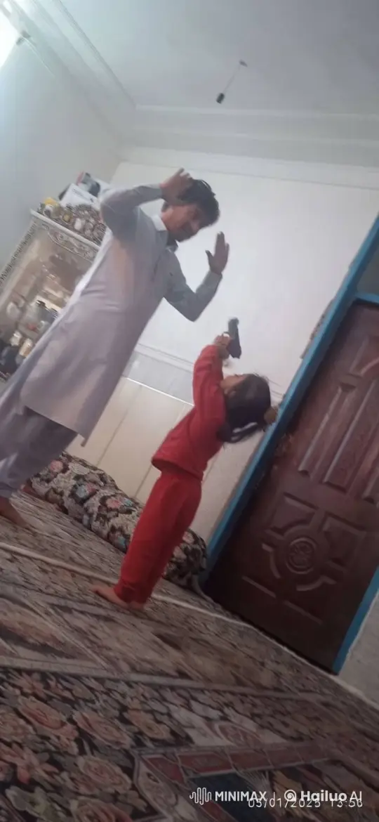 Girl Playfully 'Shoots' with Toy Gun, Man Pretends to Surrender – AI Generated Video | Hailuo AI
