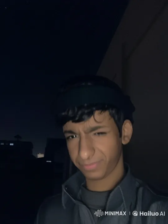 Young Individual Smokes in Thoughtful Mood at Night – AI Generated Video | Hailuo AI