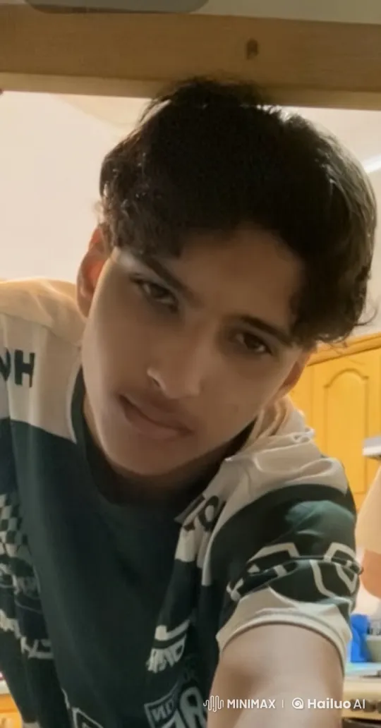 Young Man Smoking Calmly in a Kitchen Setting – AI Generated Video | Hailuo AI