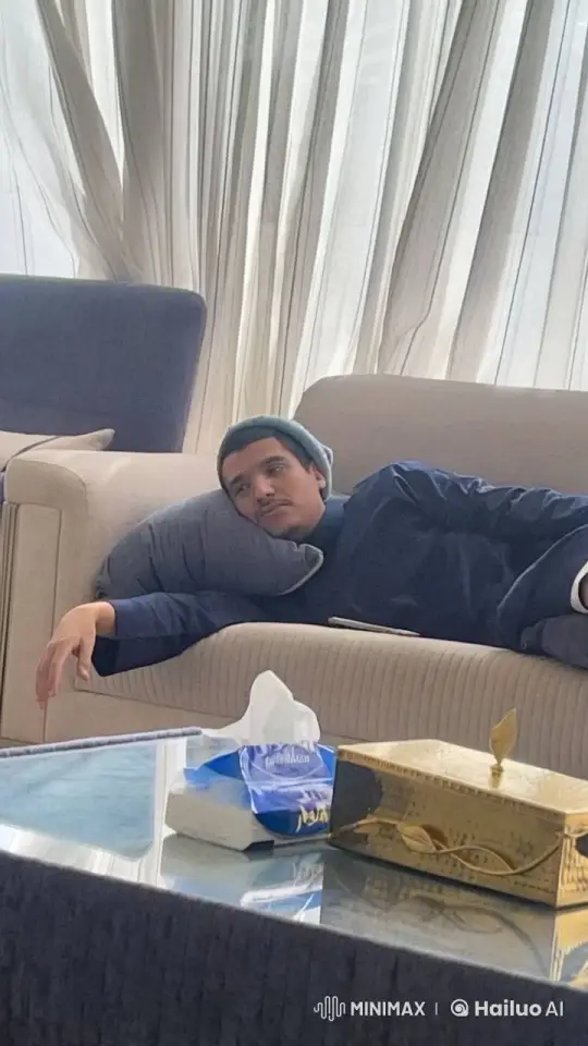 Man Relaxing with Cigarette on Couch – AI Generated Video | Hailuo AI