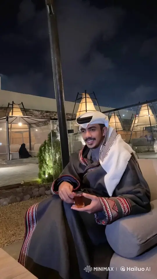 Man Enjoying Tea and Cigarette at Night Cafe – AI Generated Video | Hailuo AI