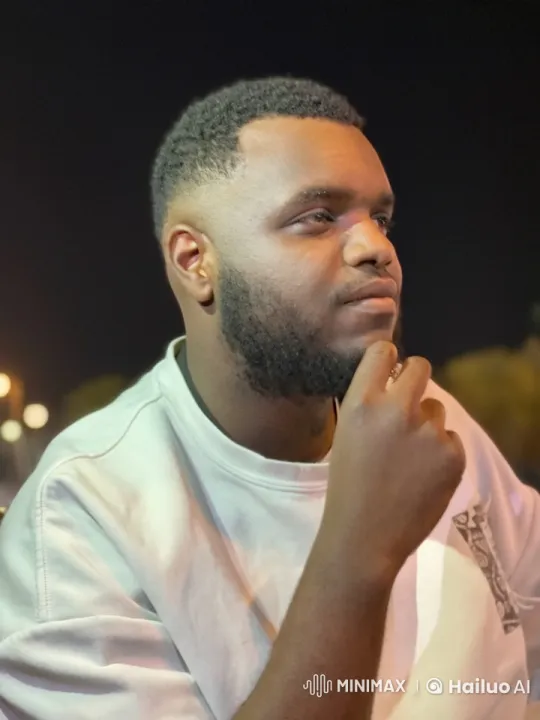 Contemplative Man Smoking in Dimly Lit Night – AI Generated Video | Hailuo AI