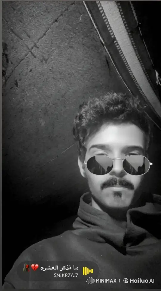 Young Man Smoking Calmly in Atmospheric Setting – AI Generated Video | Hailuo AI