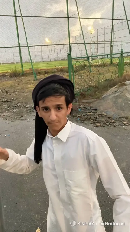 Young Person Reflects with Cigarette in Overcast Setting – AI Generated Video | Hailuo AI