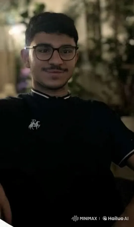 Young Man Smoking Calmly in Dimly Lit Setting – AI Generated Video | Hailuo AI