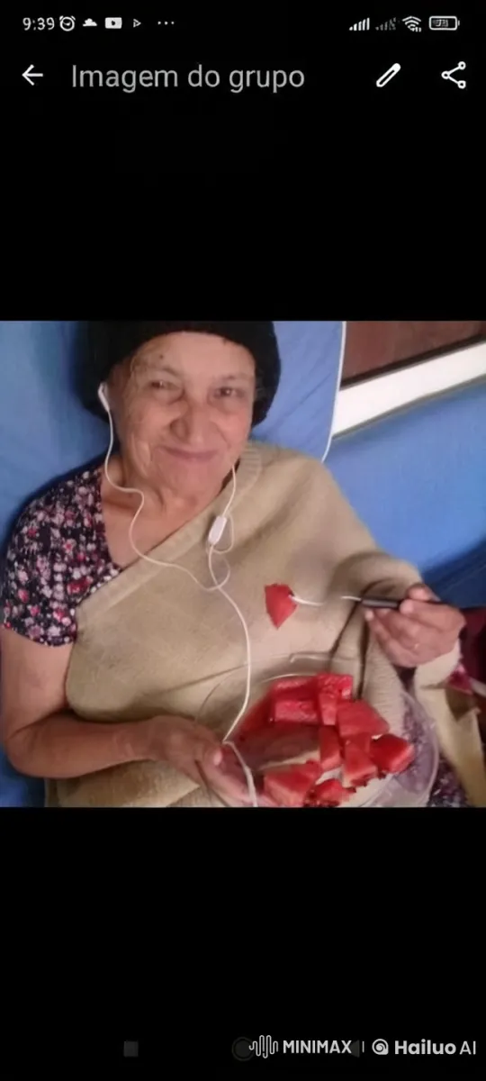 Elderly Woman Enjoying Watermelon with Music – AI Generated Video | Hailuo AI