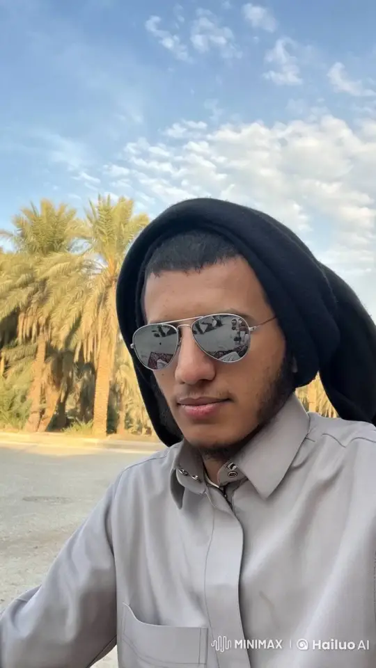 Man Relaxing with Cigarette, Palm Trees, and Gentle Breeze – AI Generated Video | Hailuo AI