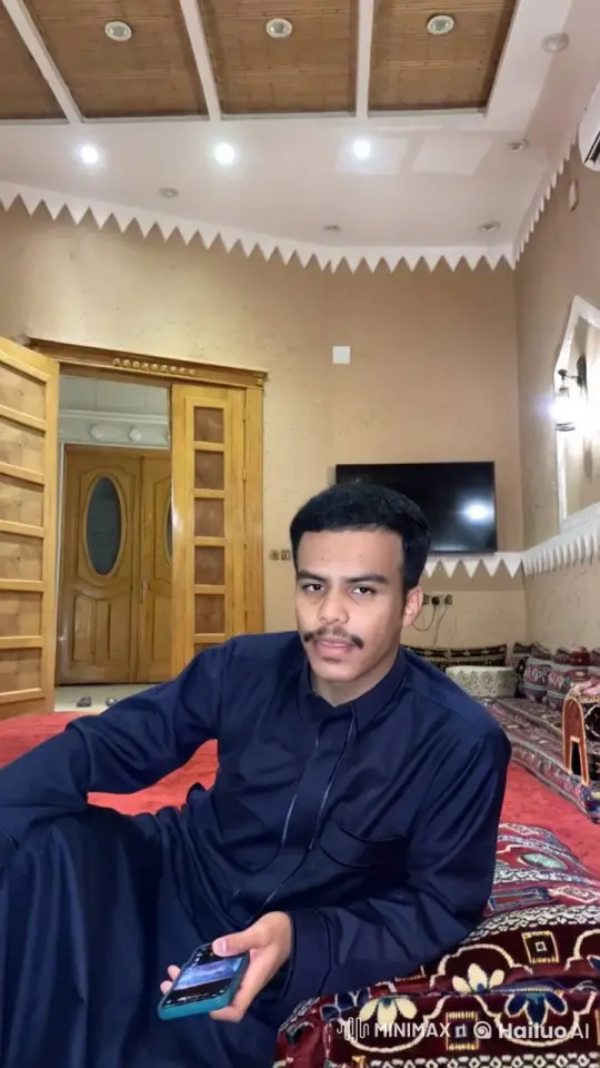 Traditional Room: Person Smokes Reflectively – AI Generated Video | Hailuo AI