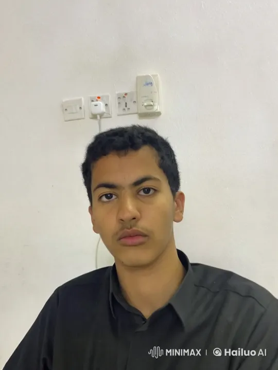 Young Man Smoking Calmly in Neutral Setting – AI Generated Video | Hailuo AI