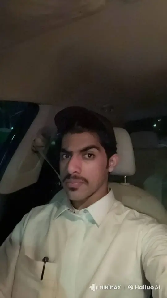 Young Man Smoking in a Car at Night – AI Generated Video | Hailuo AI
