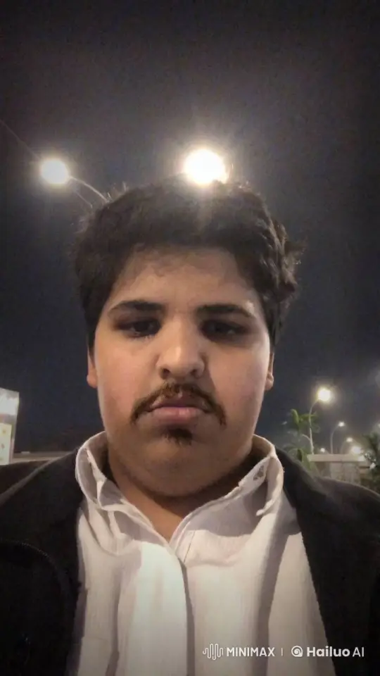 Young Man Smoking Under Street Lights – AI Generated Video | Hailuo AI