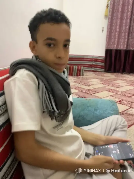 Boy Relaxing with Phone and Cigarette in Elegant Room – AI Generated Video | Hailuo AI
