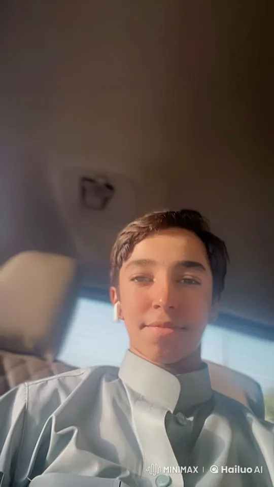 Young Man Smoking in Daylit Car – AI Generated Video | Hailuo AI