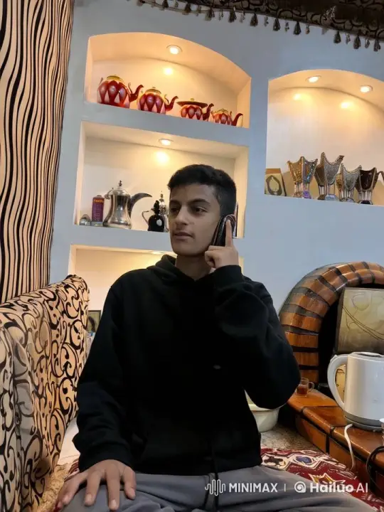 Young Person on Phone in Cozy, Decorated Room – AI Generated Video | Hailuo AI