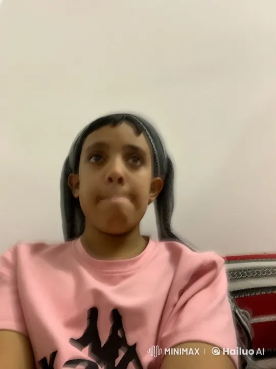 Contemplative Smoking Moment on Patterned Sofa – AI Generated Video | Hailuo AI
