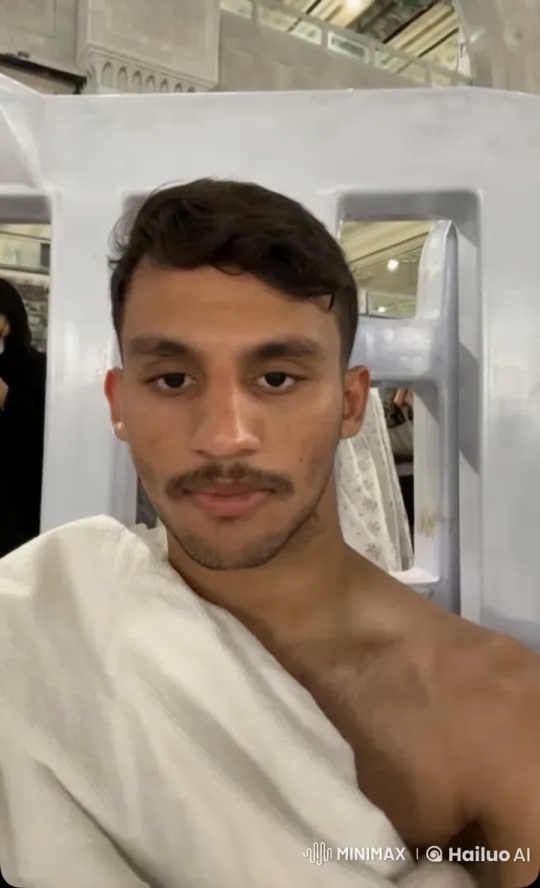 Young Man Smoking Calmly in Static Setting – AI Generated Video | Hailuo AI