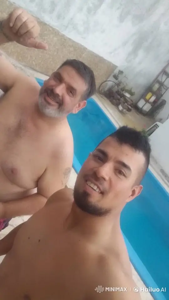 Poolside: Men Share Kiss and Moment of Emotion – AI Generated Video | Hailuo AI