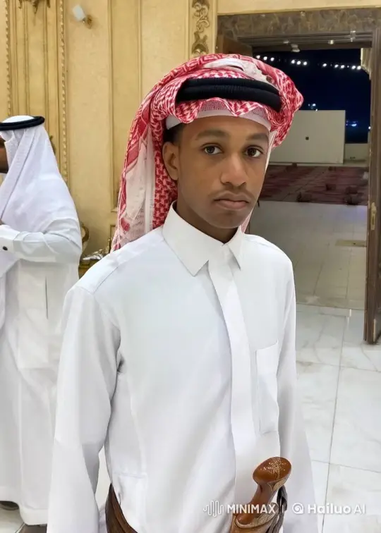 Young Man in Traditional Attire Smokes Calmly – AI Generated Video | Hailuo AI