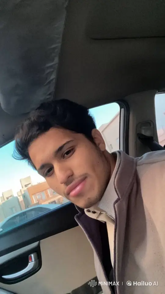 Young Man Reflects While Smoking in Moving Car – AI Generated Video | Hailuo AI