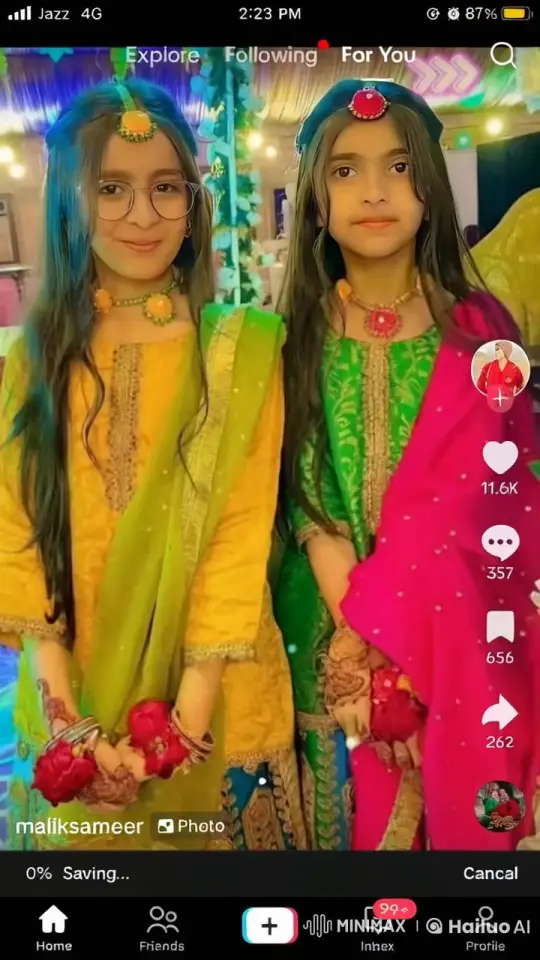 Two Girls in Traditional Outfits Celebrate Festively – AI Generated Video | Hailuo AI