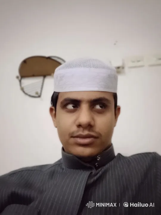 Young Man Smokes Cigarette with Reflective Manner – AI Generated Video | Hailuo AI