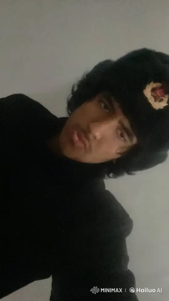 Contemplative Smoking Scene with Fur Hat – AI Generated Video | Hailuo AI