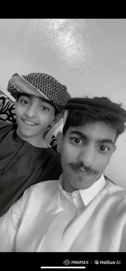 Young Men Share a Moment, One Smokes Cigarette – AI Generated Video | Hailuo AI