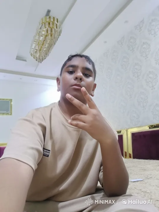 Young Individual Smoking Calmly in Elegant Room – AI Generated Video | Hailuo AI