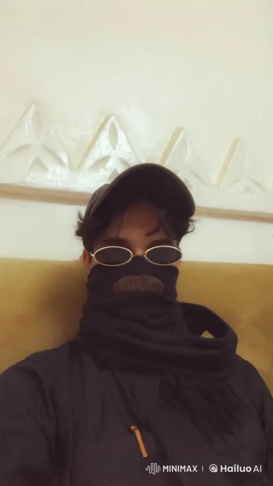 Mysterious Person Smoking on Couch Loop – AI Generated Video | Hailuo AI
