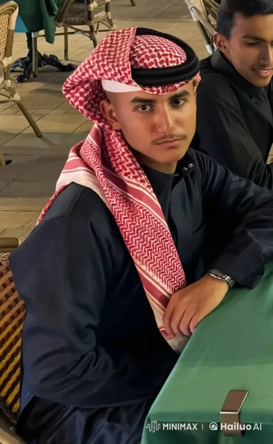 Young Man Smoking at Outdoor Café – AI Generated Video | Hailuo AI