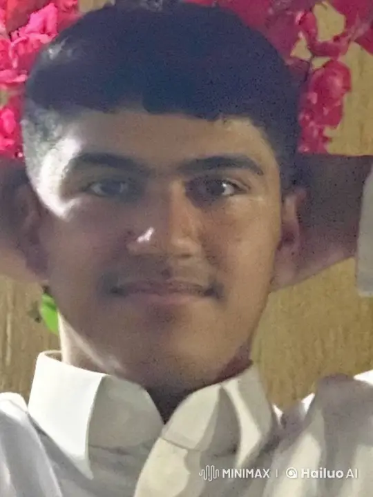 Young Man Simulates Smoking Amidst Swaying Pink Flowers – AI Generated Video | Hailuo AI