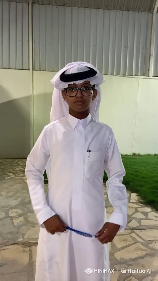 Young Man in Traditional Attire with Beads and Smoking – AI Generated Video | Hailuo AI