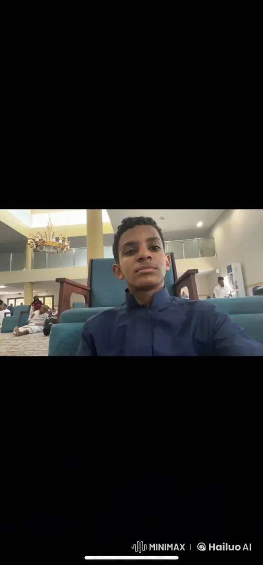 Young Individual Smoking Calmly in Modern Indoor Setting – AI Generated Video | Hailuo AI