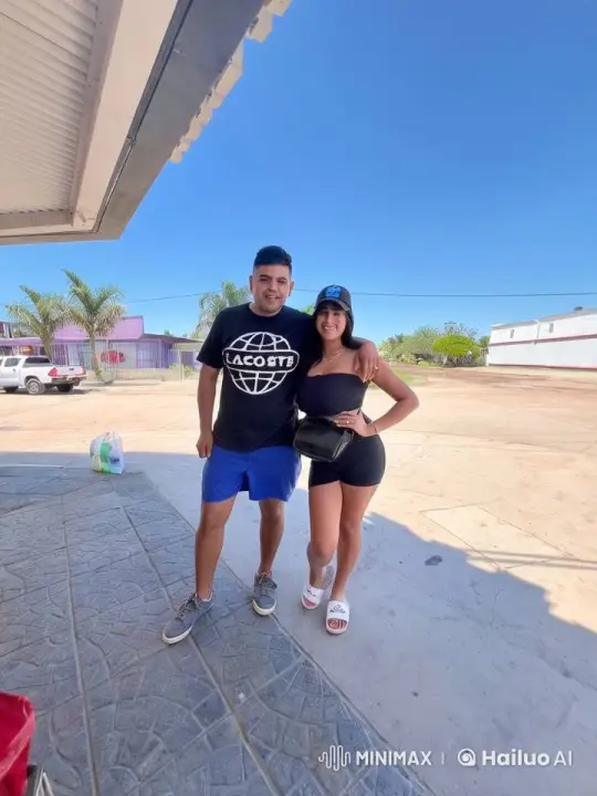Couple Poses for Photo, Receives Cheek Kiss – AI Generated Video | Hailuo AI