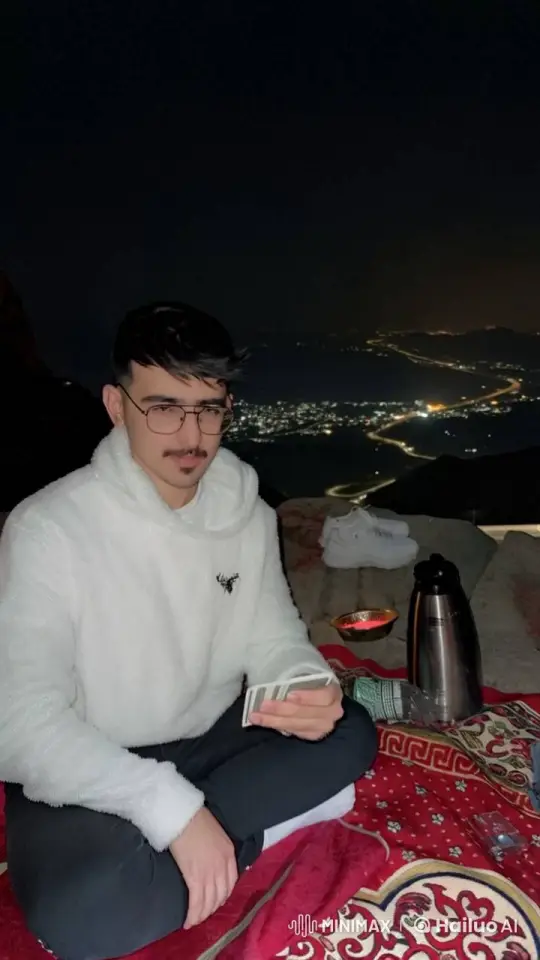 Night Outdoors: Man with Cards and City Lights – AI Generated Video | Hailuo AI
